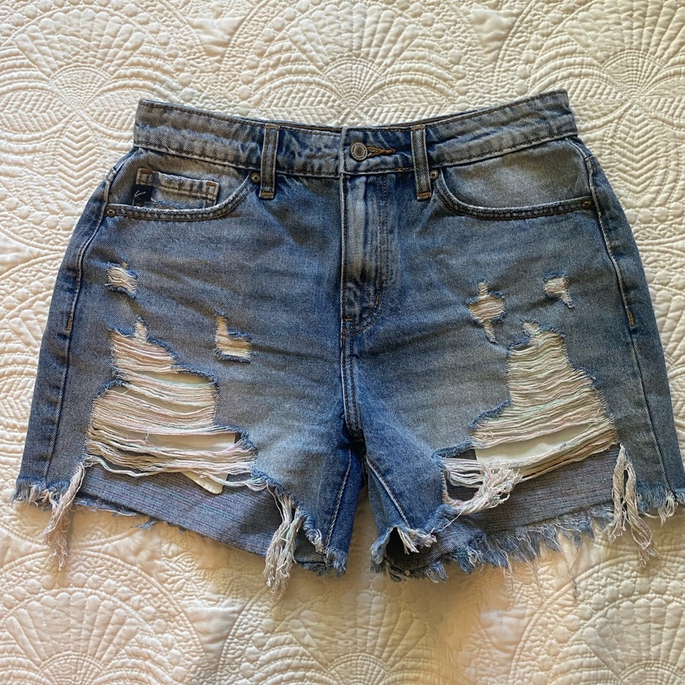 KanCan Women’s distressed blue jean shorts